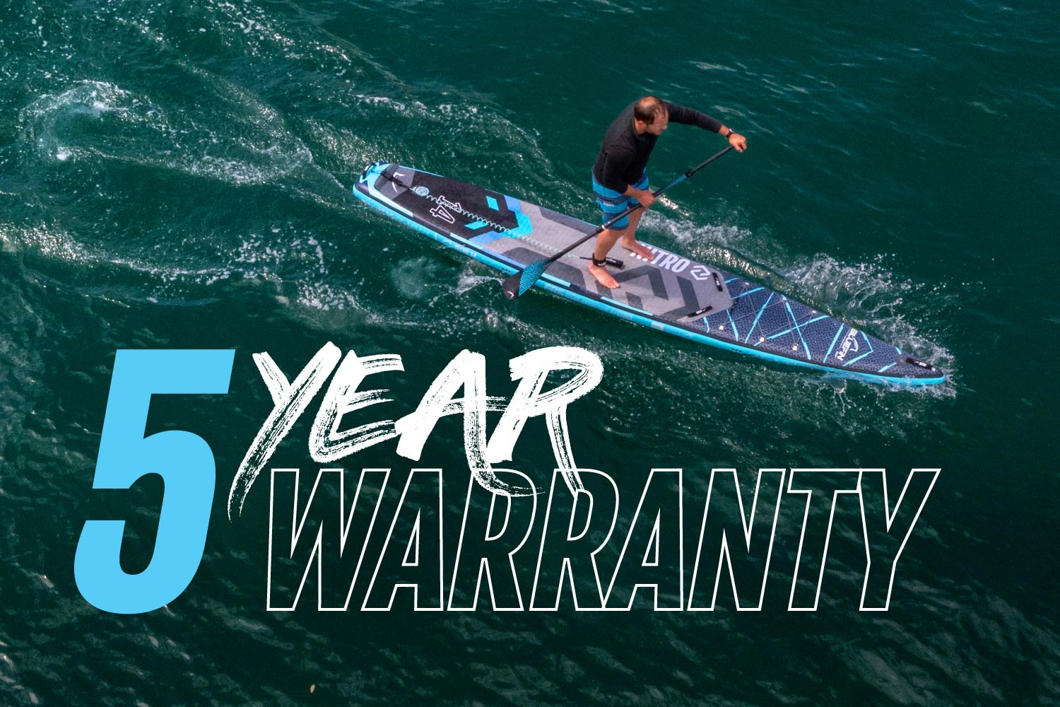 Person paddleboarding on a blue water surface with "5 YEAR WARRANTY" text overlay.