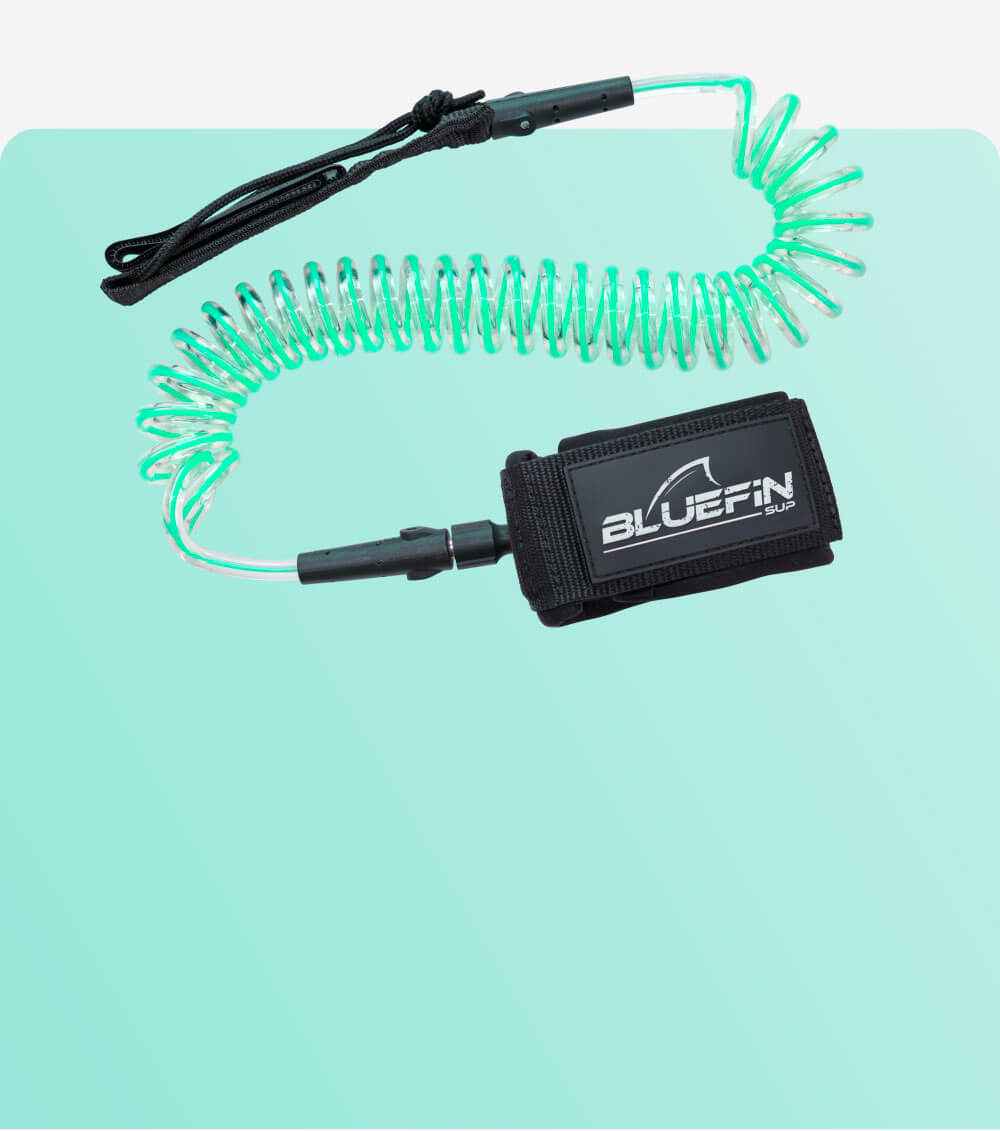 Bluefin SUP coiled leash with adjustable ankle strap for paddleboarding safety.