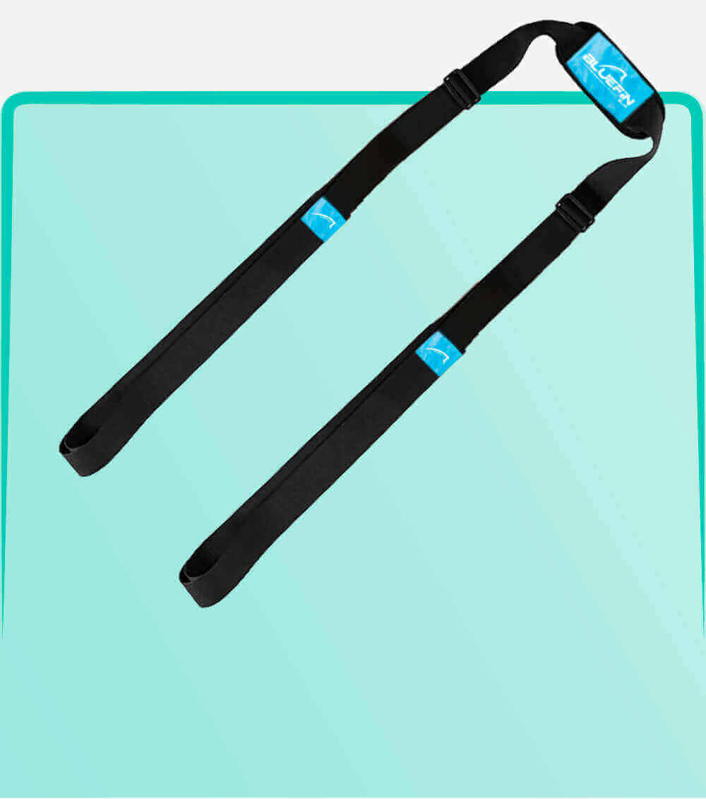 Black paddleboard straps with blue logo, designed for carrying or securing boards.