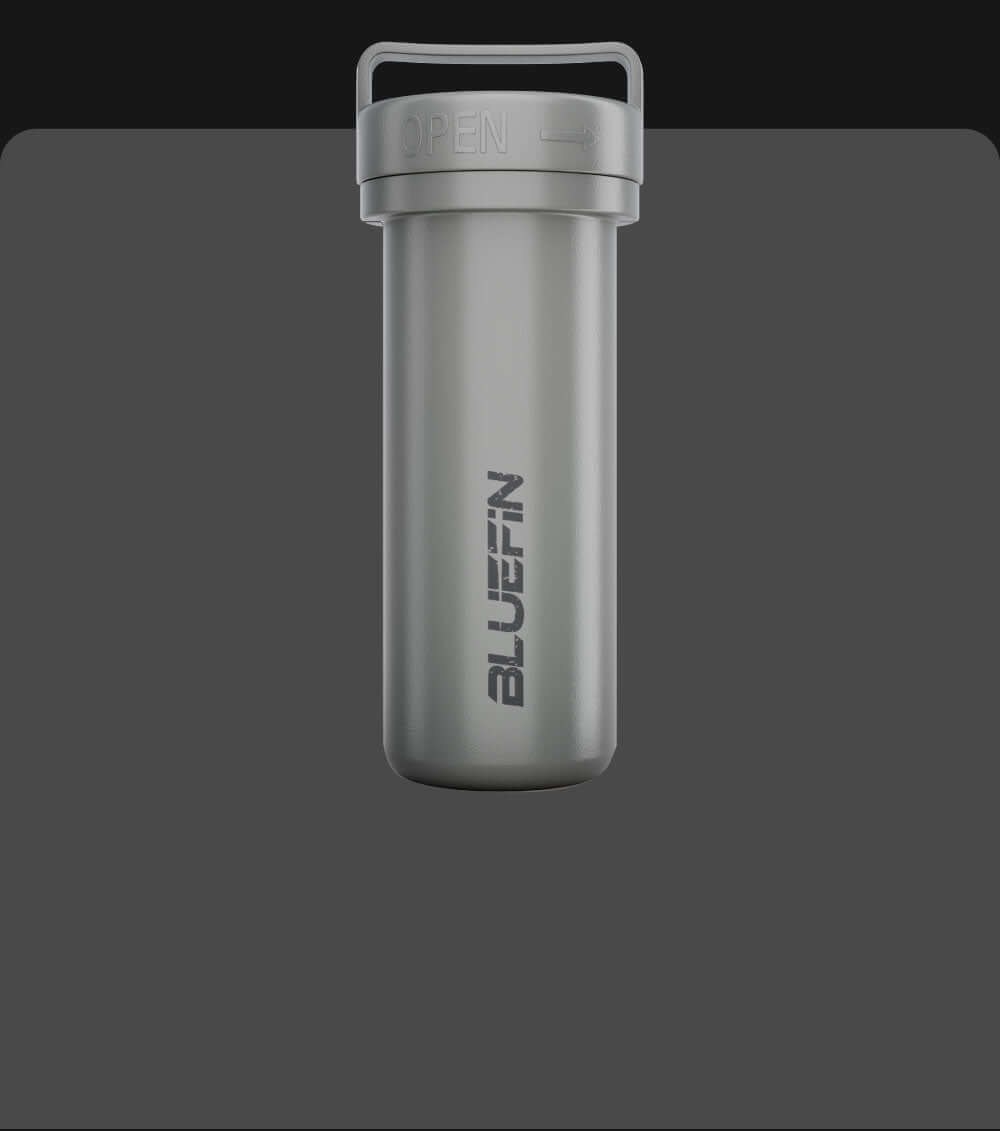 Bluefin SUP gray waterproof storage container with "OPEN" label on the lid. Ideal for outdoor activities.