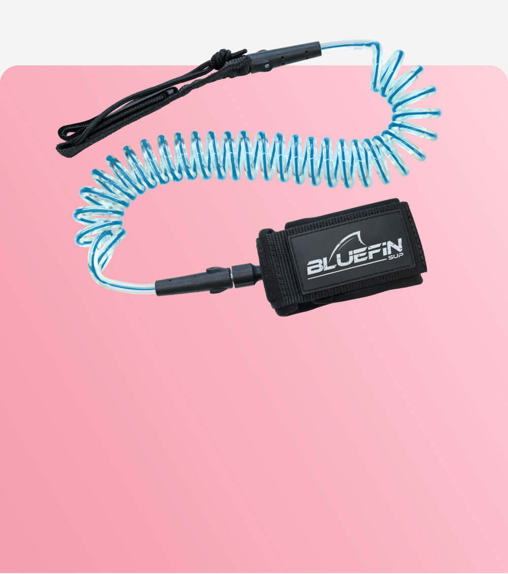 Bluefin SUP coiled leash with adjustable strap, ideal for paddleboarding safety.
