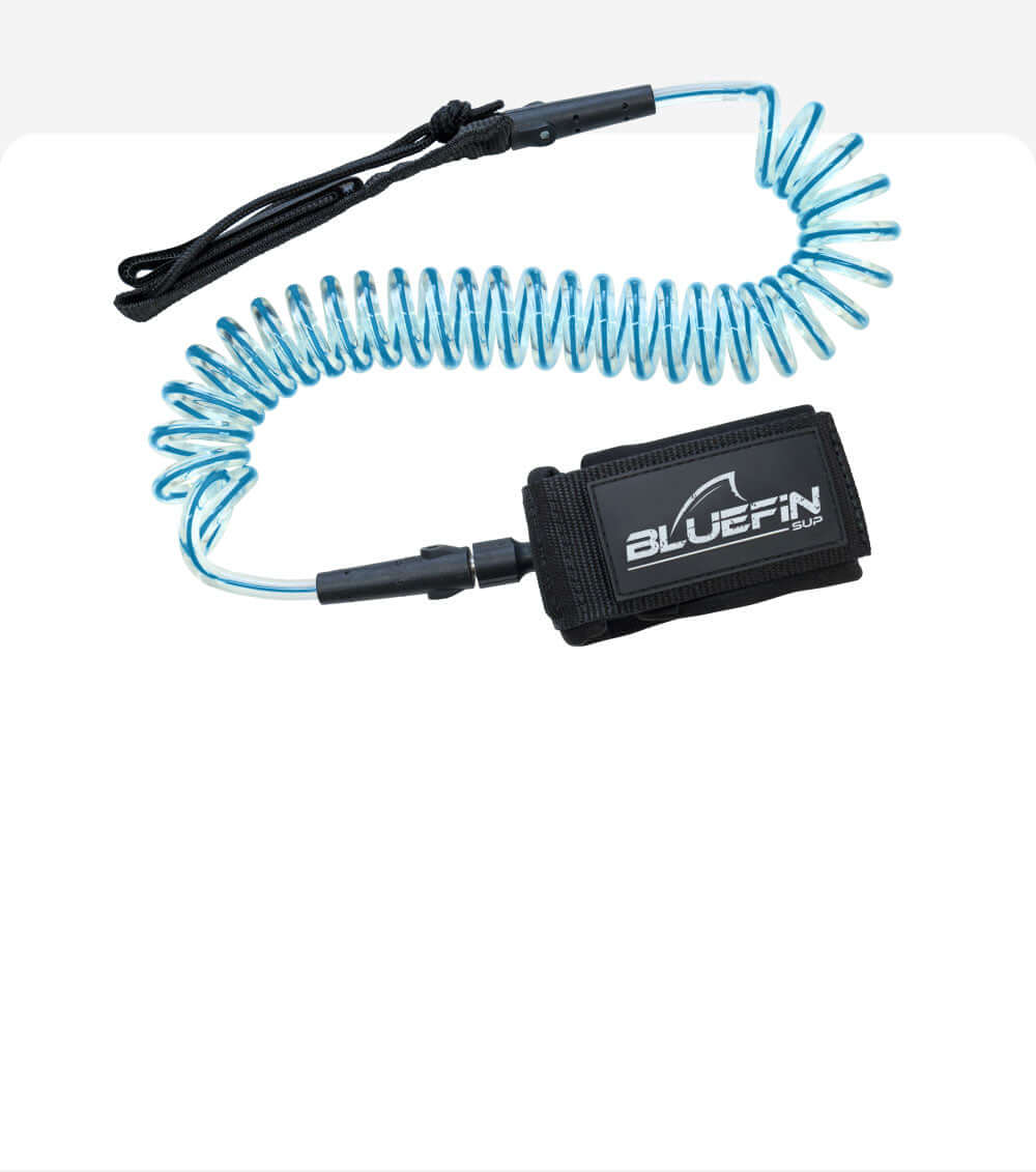 Bluefin SUP coiled leash with adjustable ankle strap for paddleboarding safety.