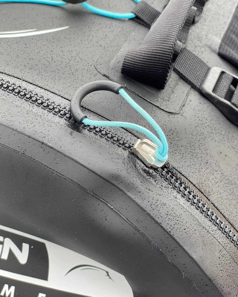 Close-up of a zipper on a black dri-tide bag
