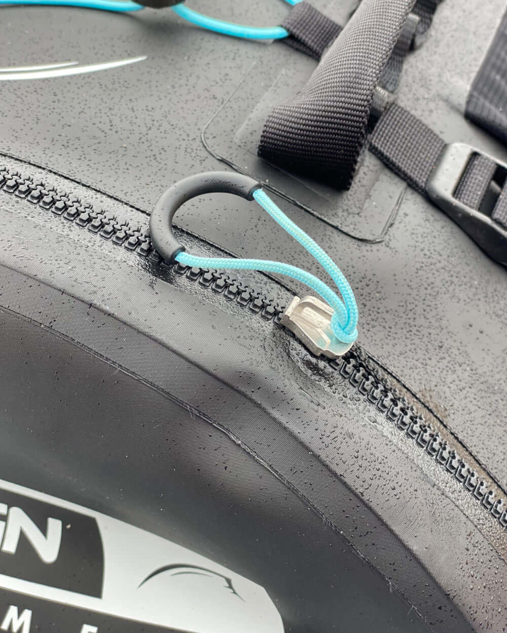 Close-up of a zipper on a black dri-tide bag