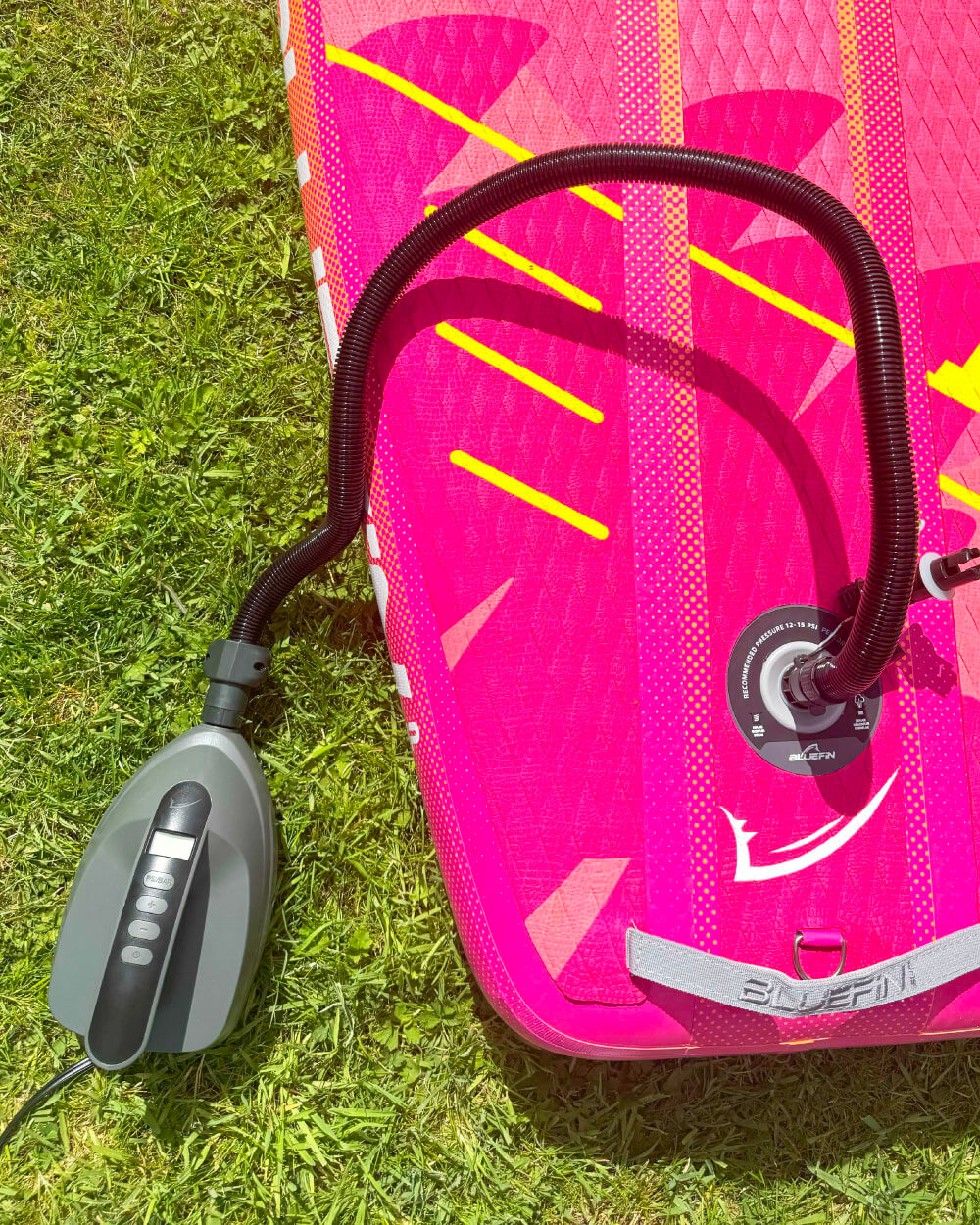 Photo of a Bluefin pump inflating a paddleboard