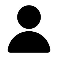 Black silhouette of a person with a circular head and rounded shoulders
