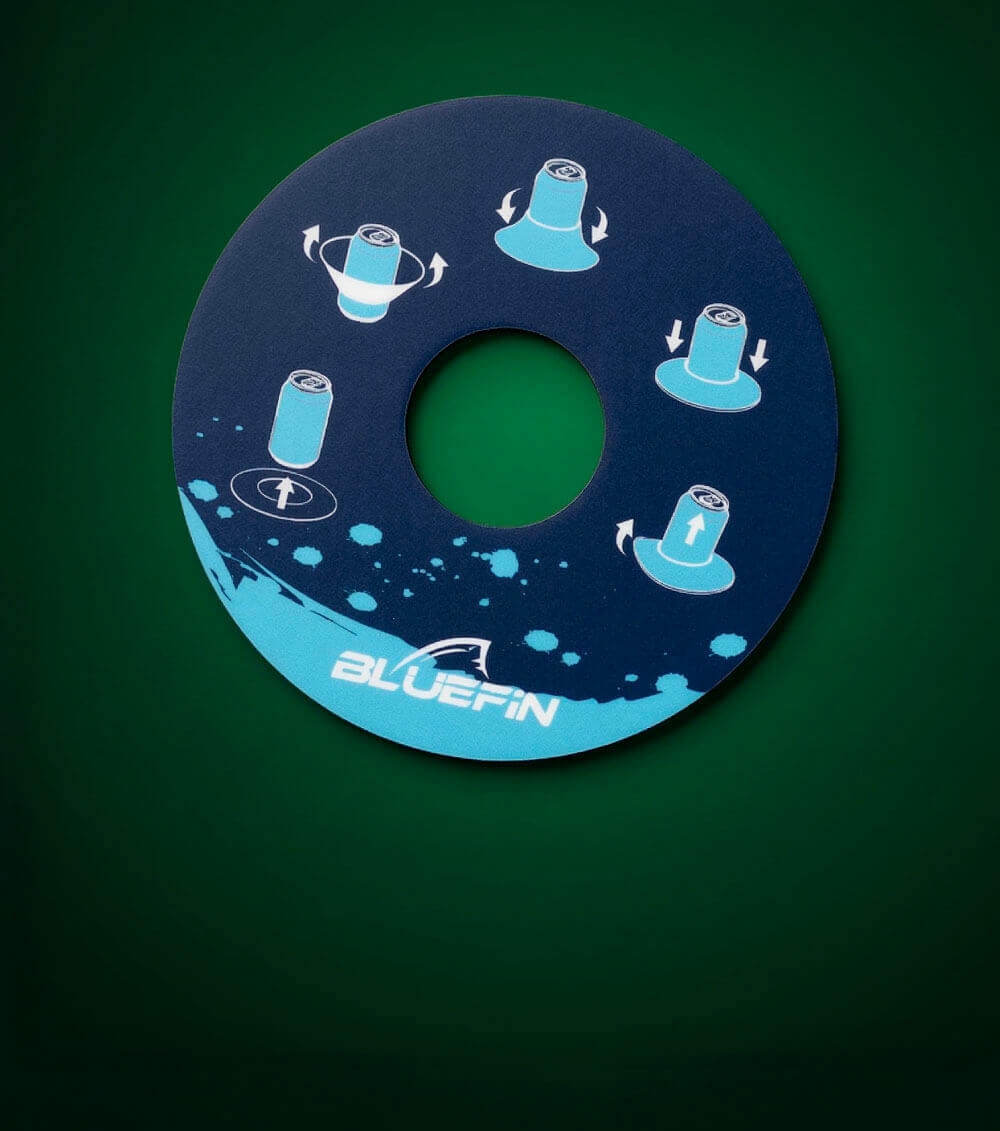 Round instructional disc with graphics showing can rotation and movement, blue and dark background