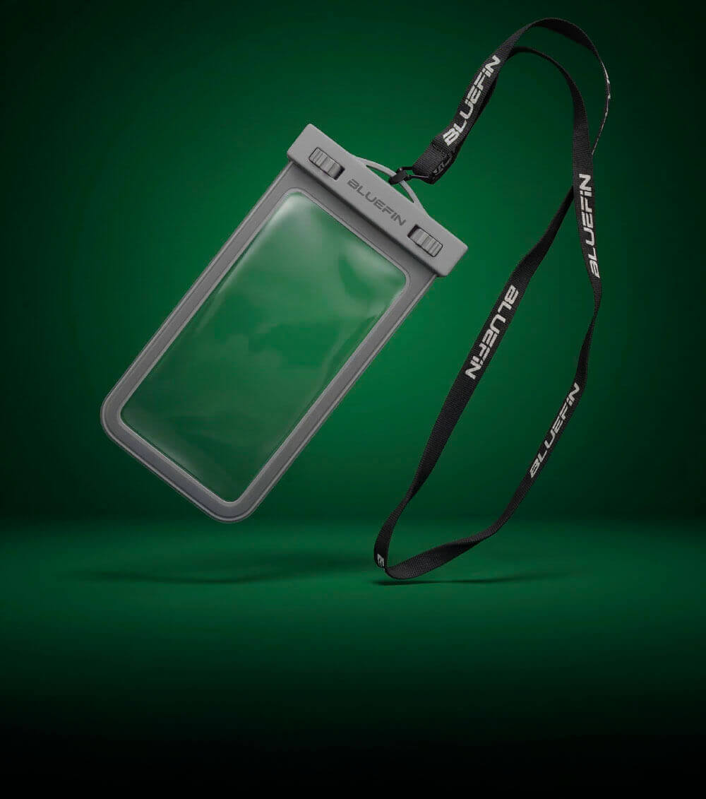 Gray waterproof phone pouch with lanyard, designed for outdoor use, suspended against a green background.