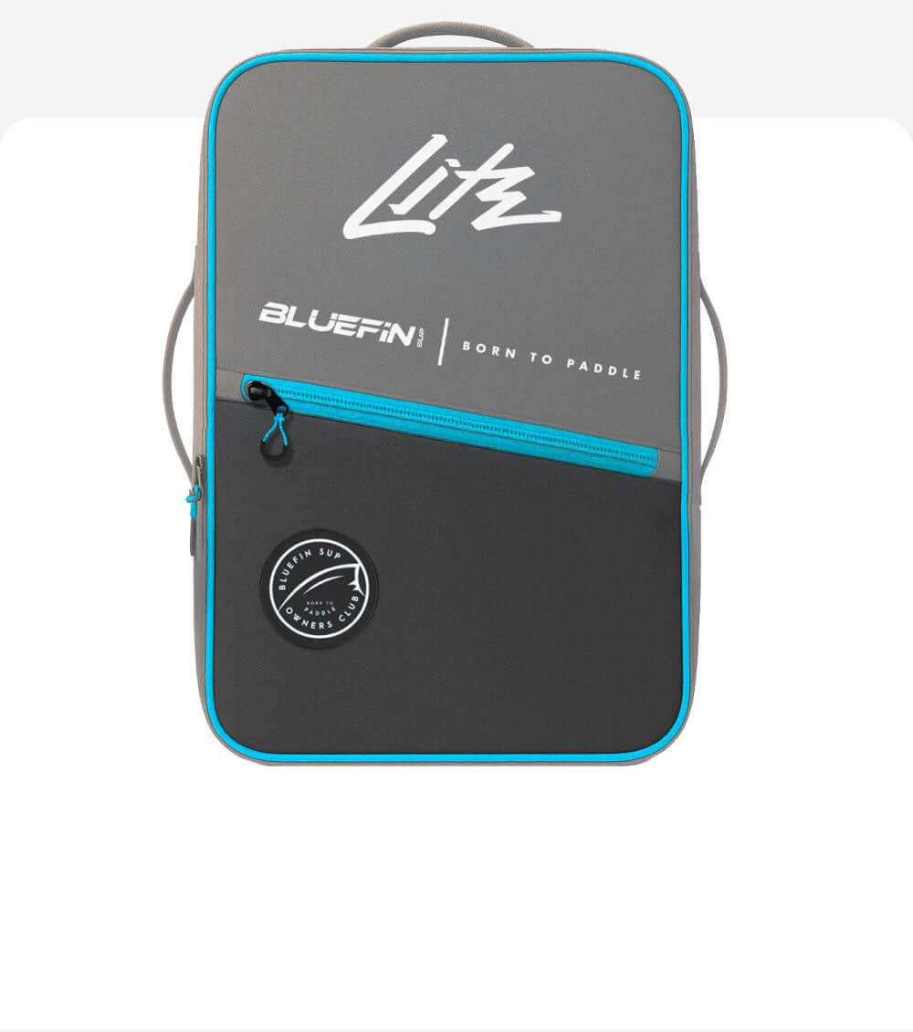 Bluefin SUP backpack in gray and blue, featuring zip closure and logo. Ideal for paddleboard enthusiasts.