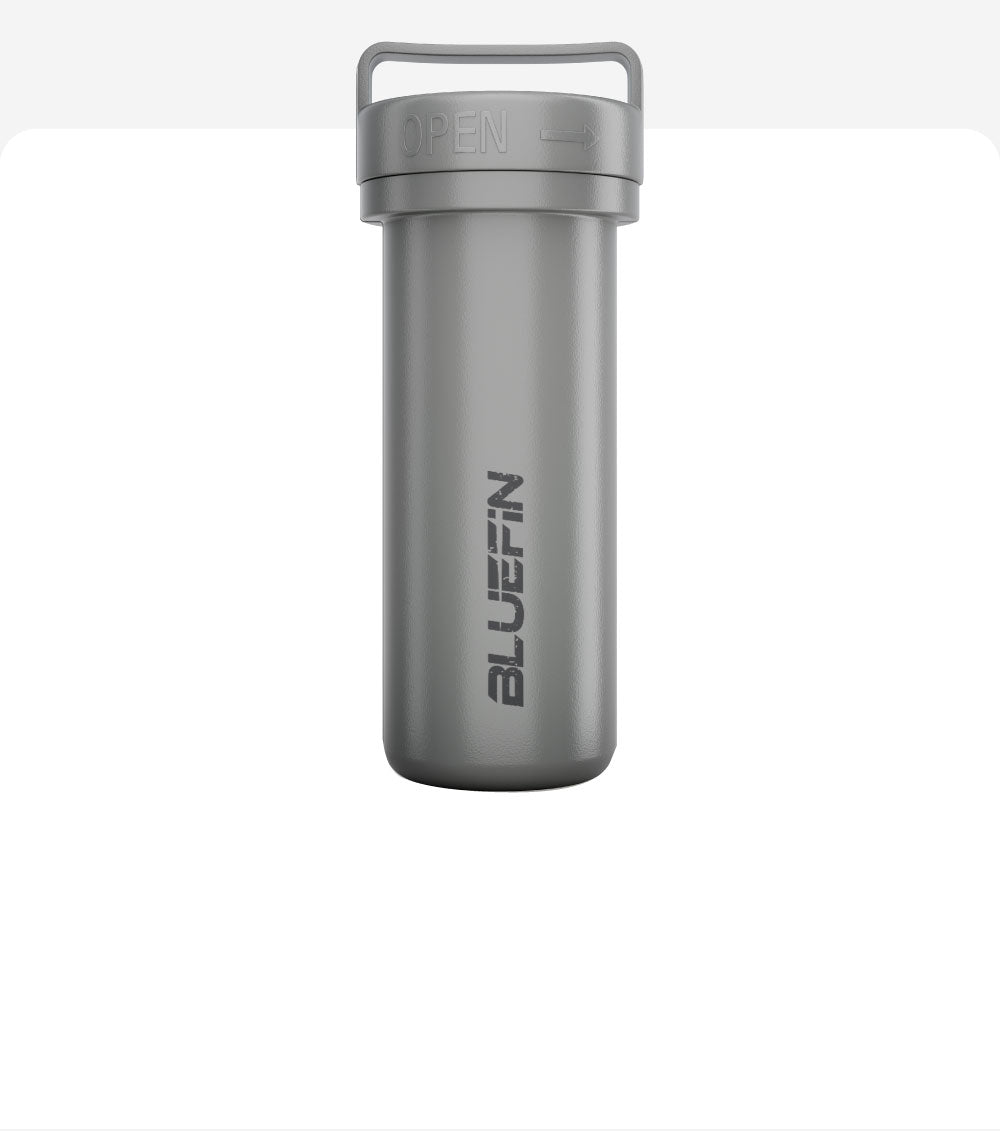 Gray waterproof storage container with "BLUEFIN" logo and an easy-open lid. Ideal for outdoor adventures.