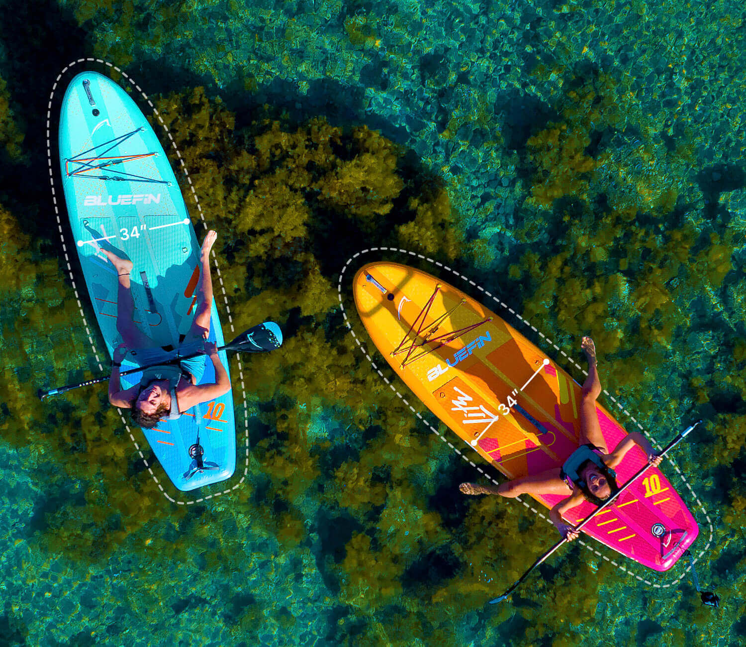 Two inflatable paddleboards in turquoise water, one blue and one orange, with paddlers relaxing on top.