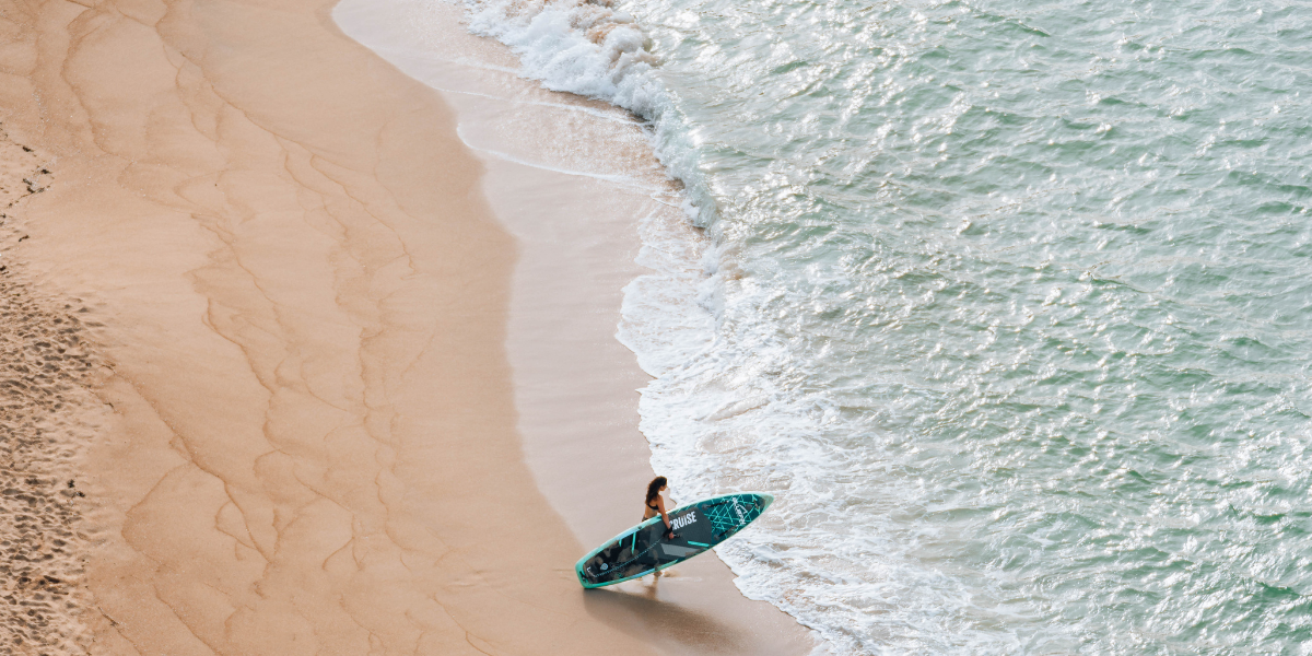 paddleboarding at a beach