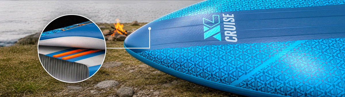 Inflatable paddleboard with blue design, textured deck pad, center fin, and inflation valve