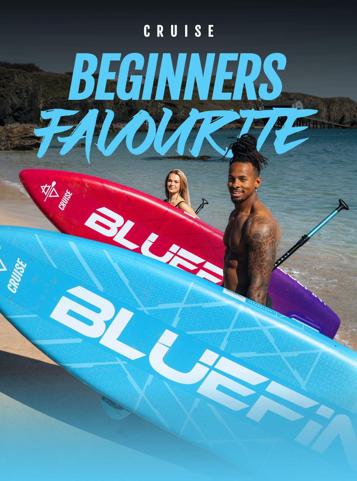 Two paddleboarders on a beach holding blue and red Bluefin paddleboards with a scenic background.