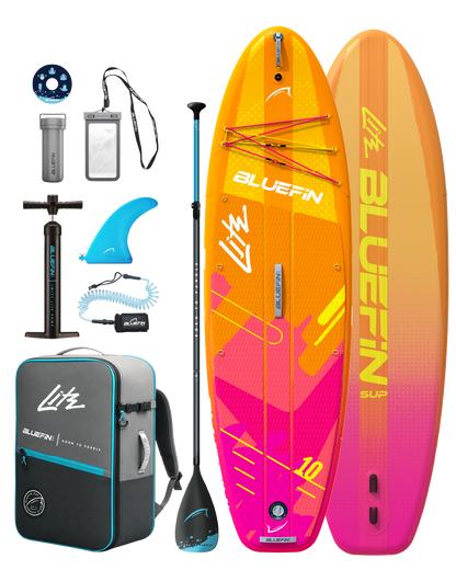Inflatable paddleboard in orange and pink with paddle, pump, fin, backpack, and accessories for water sports.