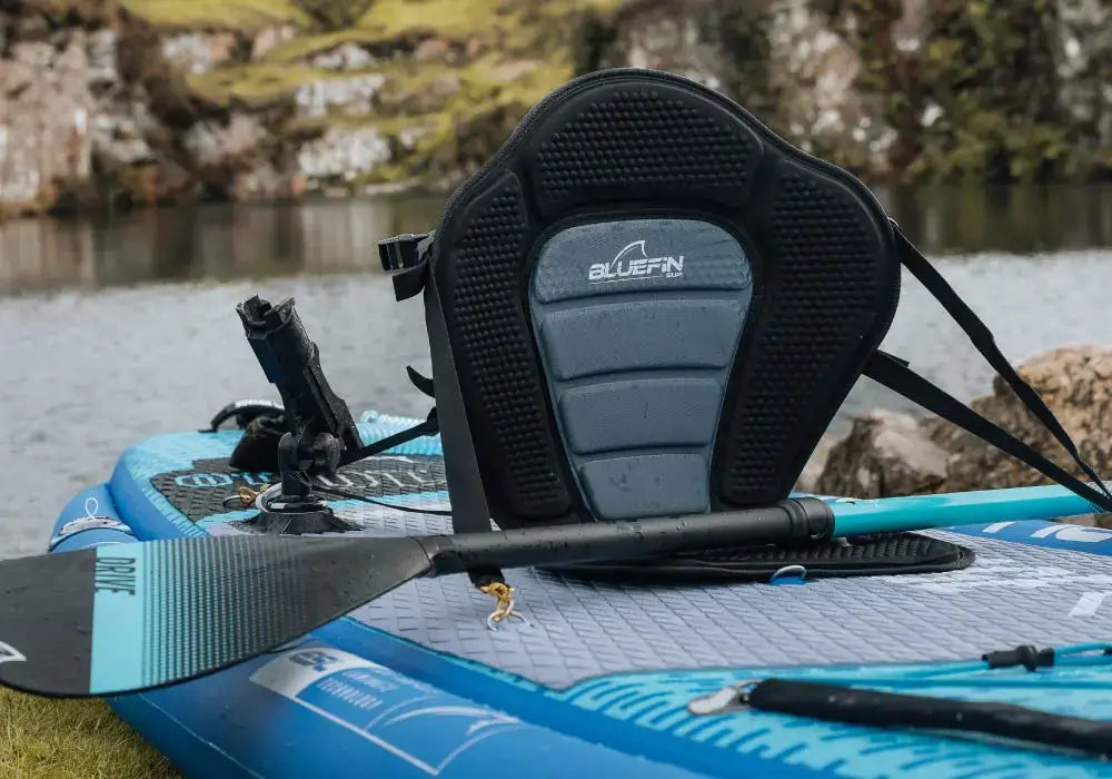 Free Kayak Conversion Kit featuring Bluefin's exclusive comfortable seat on a paddleboard.