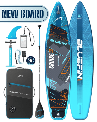 Inflatable paddleboard with blue design, center fin, paddle, pump, and carrying bag included.