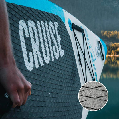 Close-up of a Bluefin SUP board showing the textured grip and logo "CRUISE" for enhanced stability.